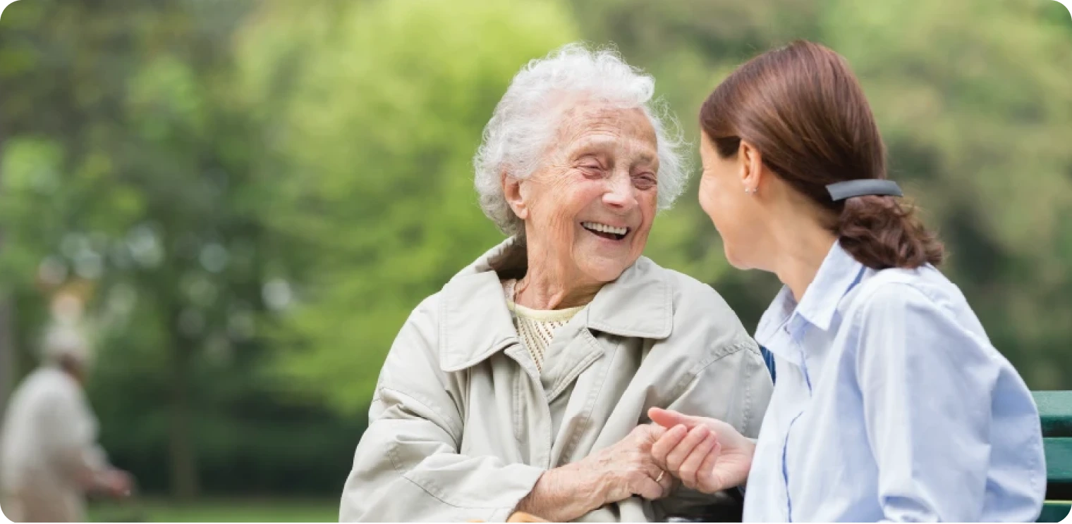 Elderly Woman on Park Bench [header]