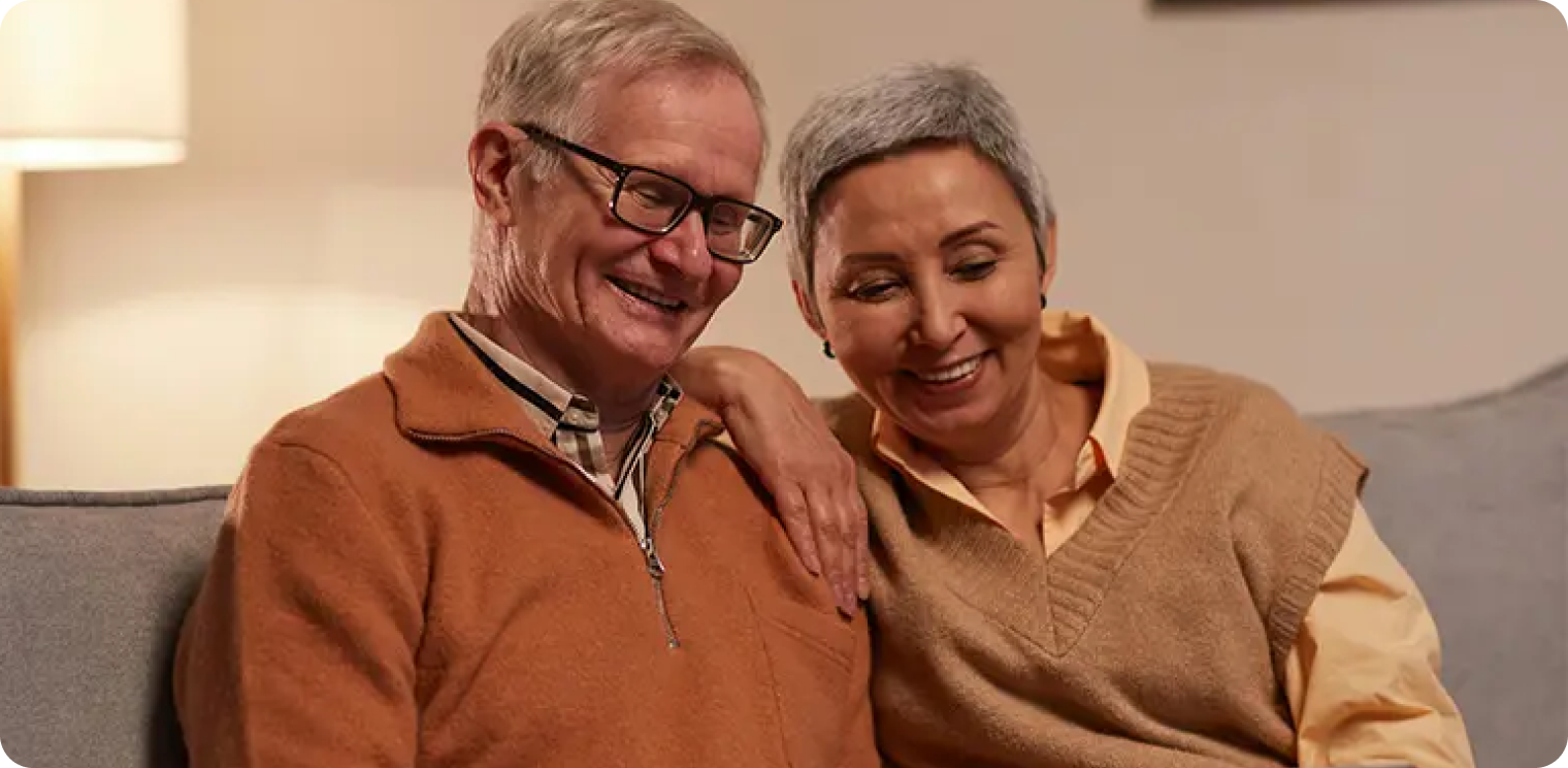 Elderly Couple on a Couch [header]