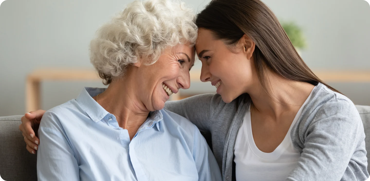 Elderly Woman and Carer Smiling [header]