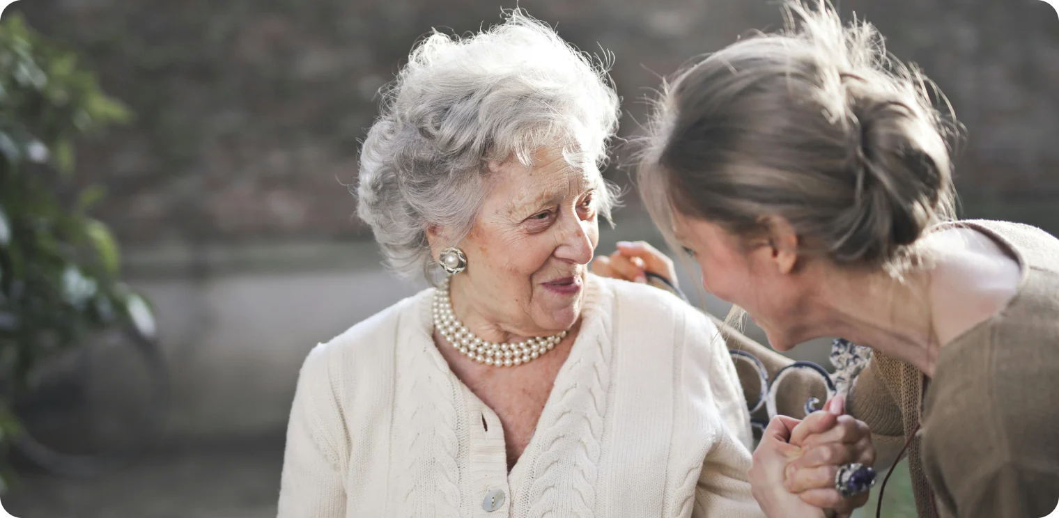 Elderly Woman Holding Hands [header]