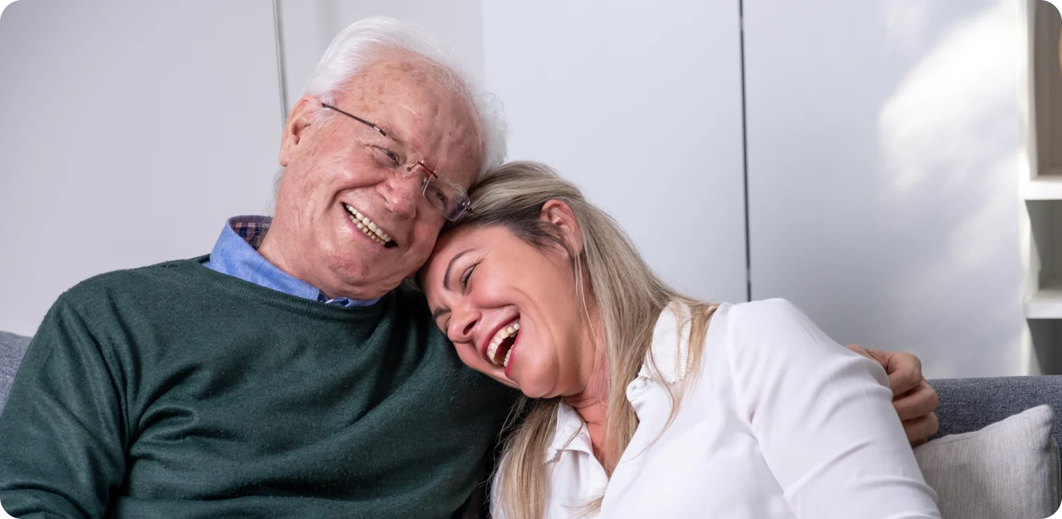 Elderly Man and Carer Laughing [header]